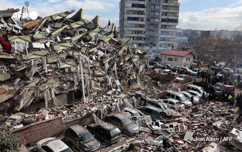Rescuers and civilians look for survivors under the rubble of collapsed buildings after an earthquake struck Turkey.